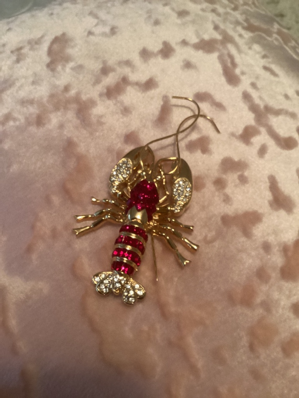 Vintage Nolan Miller lobster brooch with ruby red rhinestones